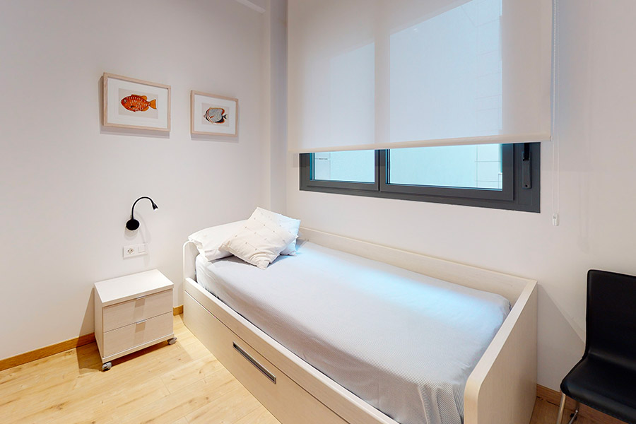 Primer plano del dormitorio con cama nido del piso de 2 habitaciones puerta A del Edificio Proinca Moncloa 